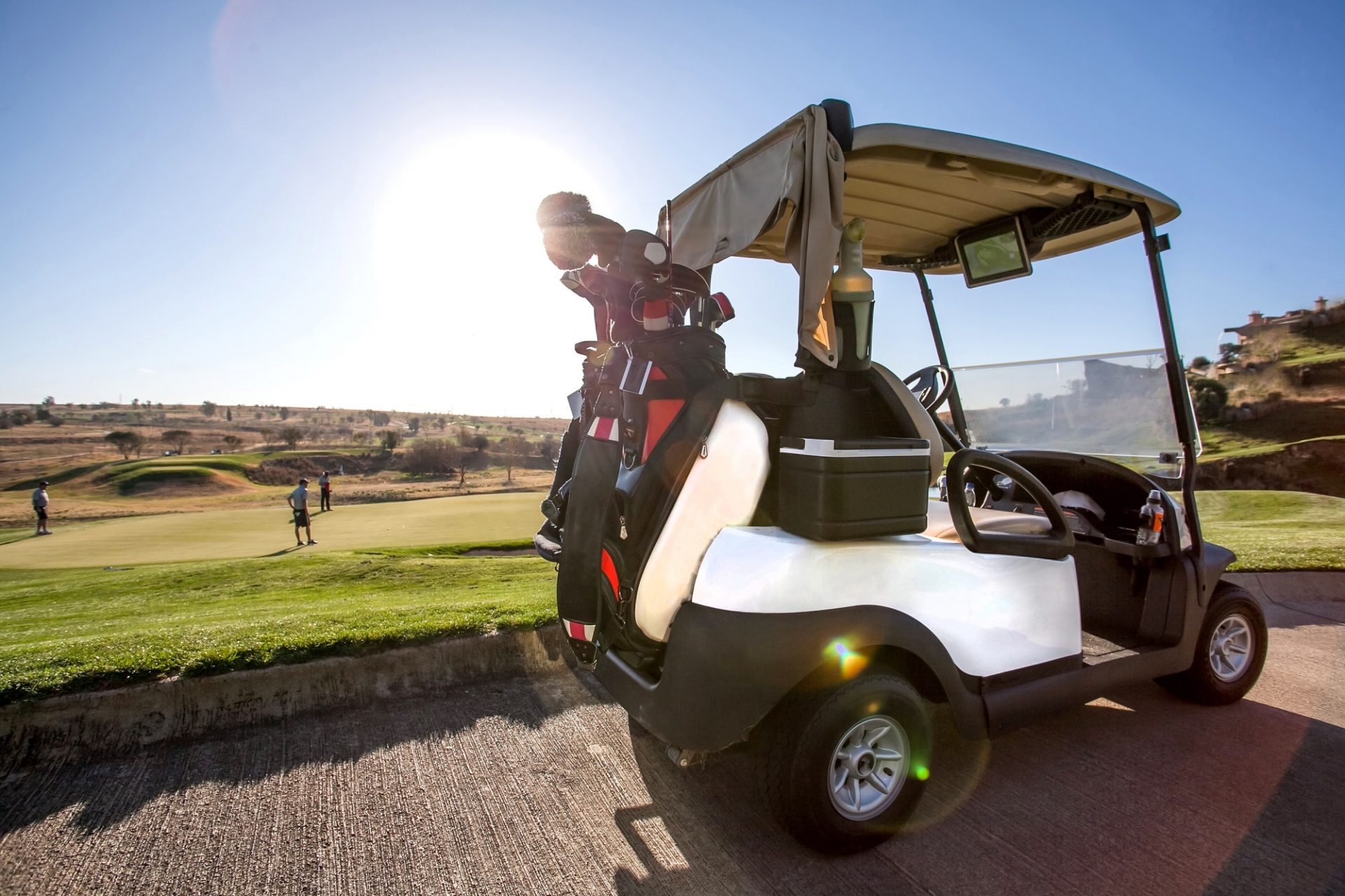 Golf cart on golf course.