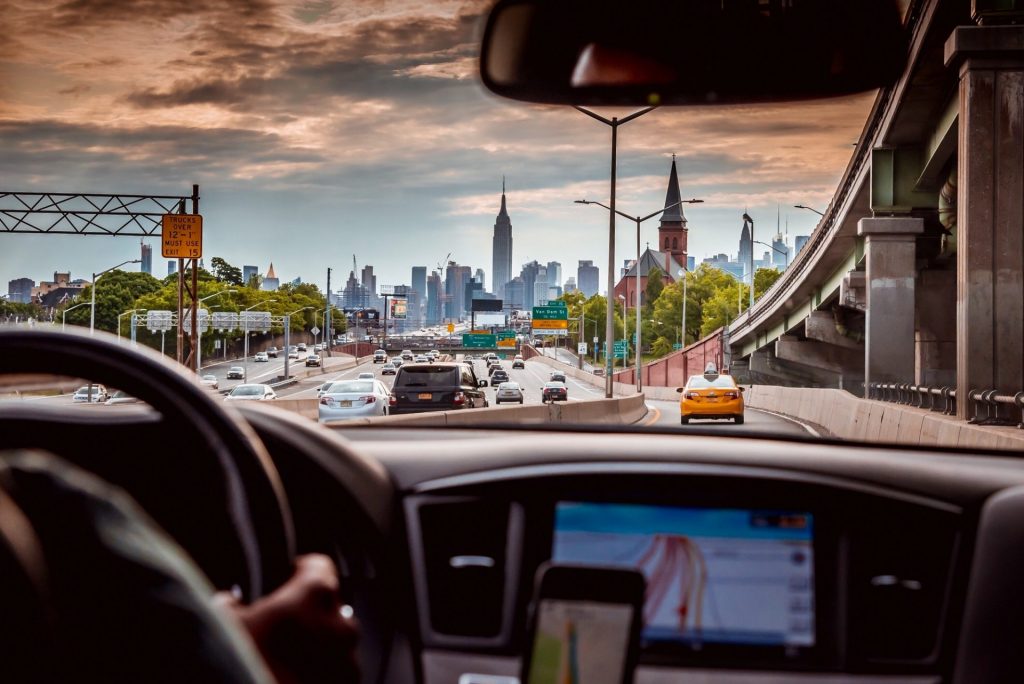 View of Empire State Building and Manhattan skyline from a Uber car.